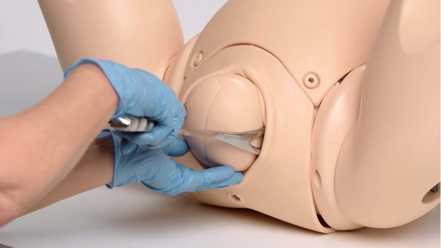 Birthing Simulator PROMPT Flex Standard version in light skin tone forceps birth demonstration 