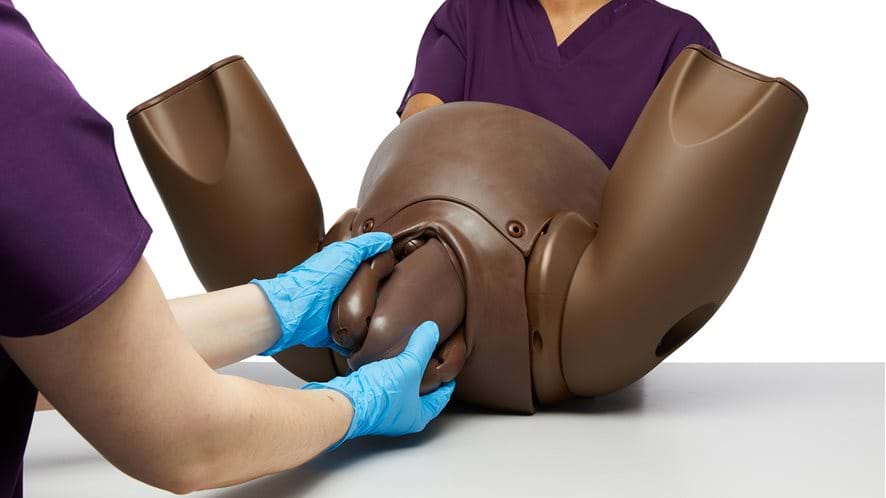 Birthing Simulator PROMPT Flex Standard version in dark skin tone birth demonstration 